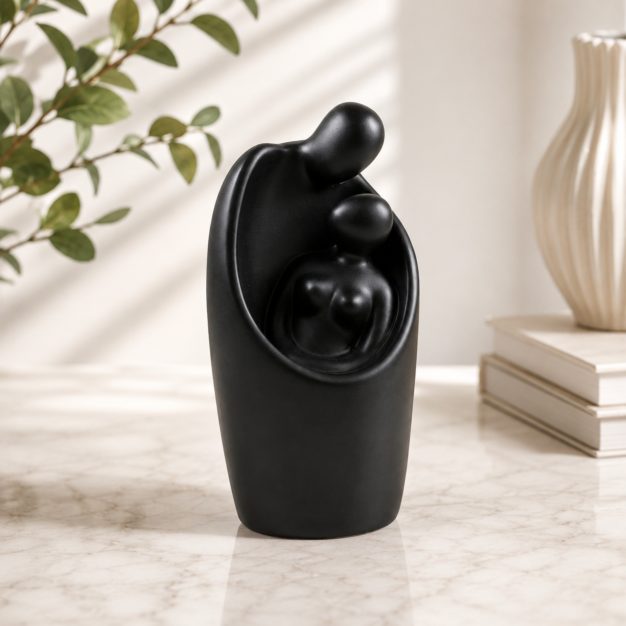 Matte Black Embrace Sculpture