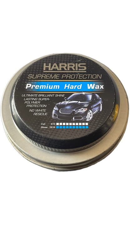 Round metal tin of Harris Premium Hard Wax for cars with black and blue label showing a shiny car